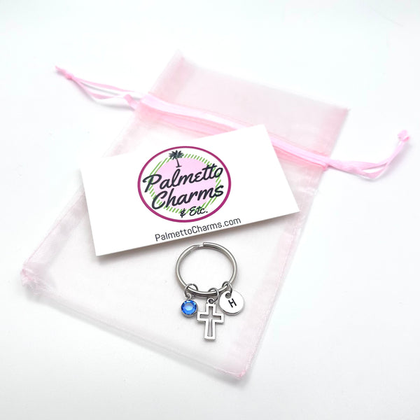 Your silver birthstone Cross Keychain will arrive ready for gift giving.