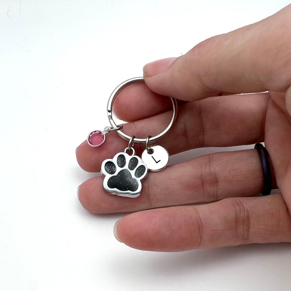 Silver Paw Print Keychain with personalization of birthstone and initial.