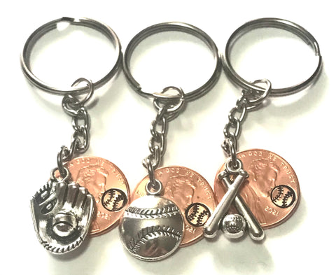 Baseball collection of silver charms with a hand stamped engraved Lincoln Cent showing a baseball design above the date.