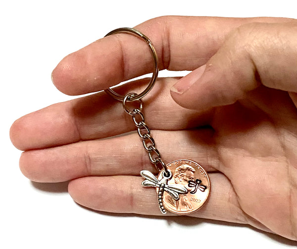 Our 3" Lucky Penny Keychain creates the perfect solution to find the right key fast. This dragonfly keychain is hand stamped with a dragonfly engraving above the date on the penny.