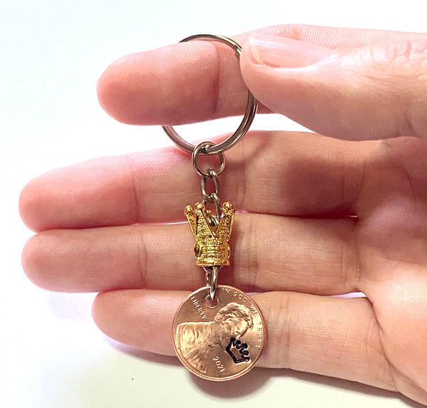 Gold Crown Princess Queen Charm with an engraved design above the date of a Lincoln Cent to make a great Lucky Penny Keychain.