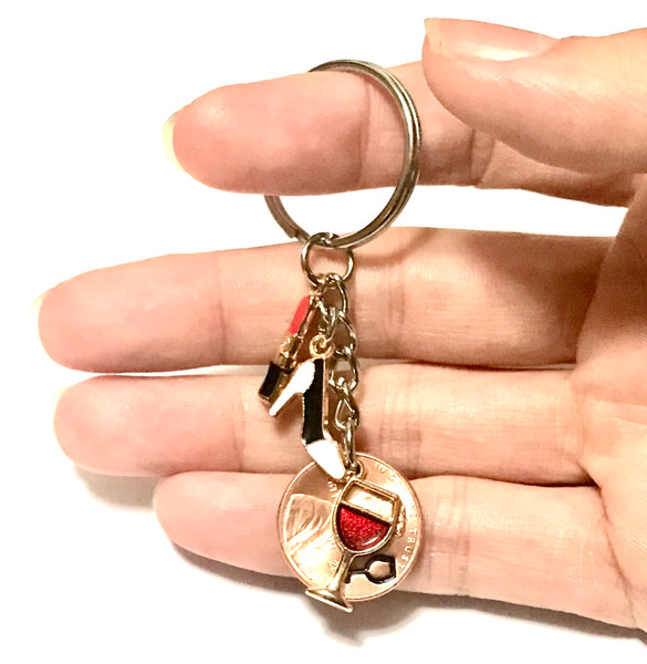 Ladies Night Out Lucky Penny Keychain with Lipstick, High Heel, and Red Wine with Wine Glass engraving above date on a penny.