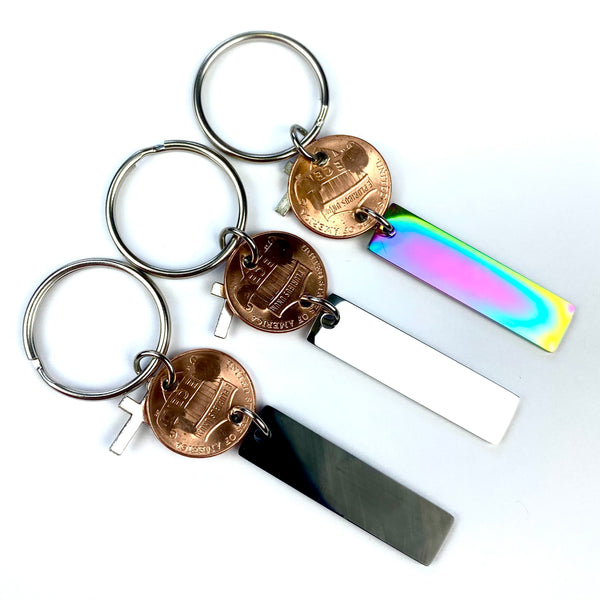 The But God Lucky Penny Keychain comes with two charms and is a great gift for men or women.