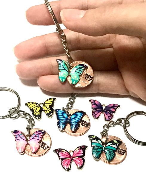 Monarch Butterfly Collection of 7 colors to choose from. Alongside a hand stamp Lincoln Cent where there is a matching butterfly engraving above the date.