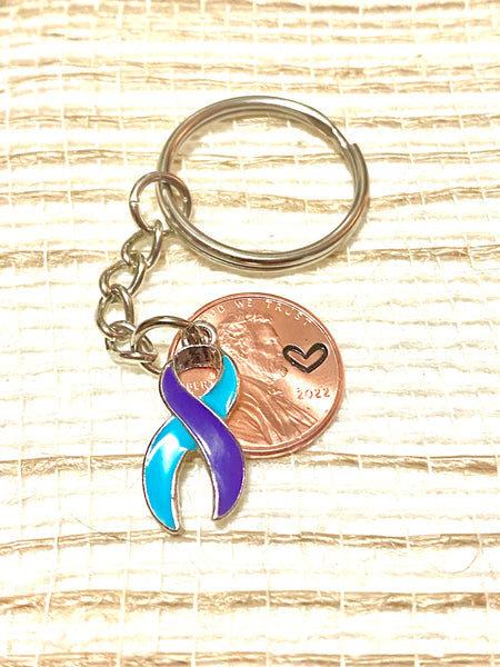 Suicide Prevention Charm on a Lucky Penny Keychain with a heart engraving.