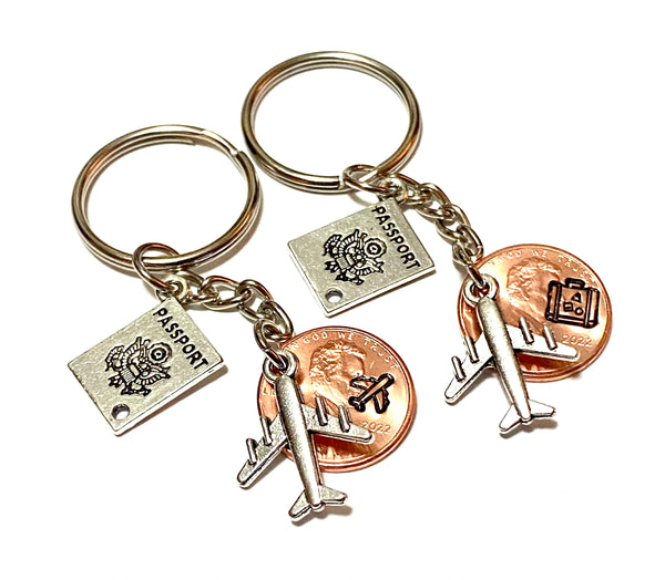 This gift for travelers is a Lucky Penny Keychain. It comes with a silver passport charm and silver airplane charm. We hand stamp your penny with a suitcase stamp or plane stamp.