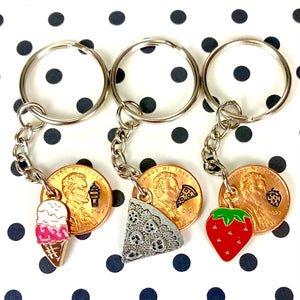 Ice Cream, Pizza, Strawberry, plus more yummy treat food charms on a lucky penny keychain with a hand stamp engraved design on a penny.