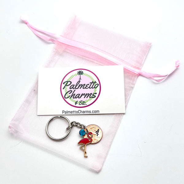 The Pink Flamingo Lucky Penny Keychain is a the perfect unique gift for mom.