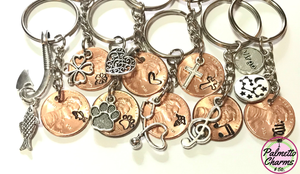 Collection of Lucky Penny Keychains including our Zodiac Series along with a variety of hand stamps we offer. Nurses, Fishermen, Musicians, Astrologists, and Pet Parents are just a few options for silver charms.