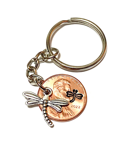 A beautiful silver dragonfly charm with a Lincoln Cent that has a detailed dragonfly design hand stamped above the date. This Lucky Penny Keychain is great for dragonfly lovers!