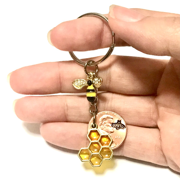 Rhinestone Honey Bee and Honeycomb Charms with engraved bee above date of Lincoln Cent on a Lucky Penny Keychain.