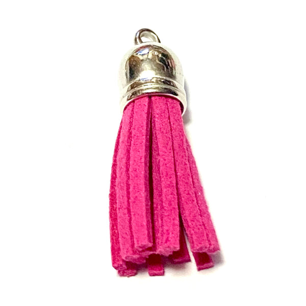 A pink 1" tassel as an addition to our lucky penny keychains.