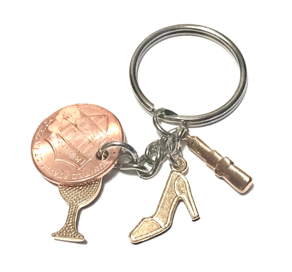 Ladies Night Out Lucky Penny Keychain with Lipstick, High Heel, and Red Wine with Wine Glass engraving above date on a penny.