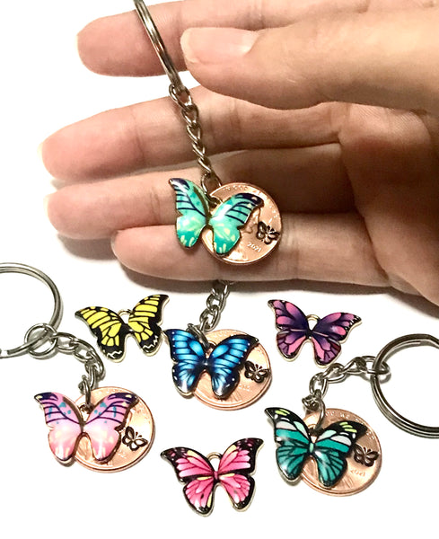 Monarch Butterfly Collection of 7 colors to choose from. Alongside a hand stamp Lincoln Cent where there is a matching butterfly engraving above the date.