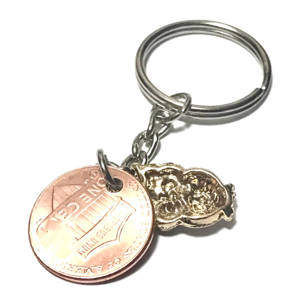 Reverse side of Owl Charm on a Lucky Penny Keychain.