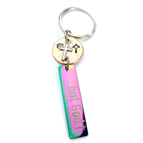 The rainbow colored stainless steel key tag on this But God Lucky Penny Keychain is a great gift for her.