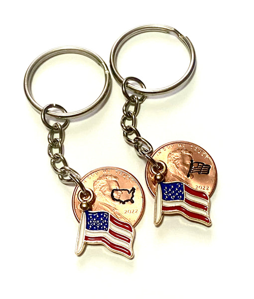 This United States of America Flag Charm is shown with your choice of hand stamp - a detailed flag design or the outline of the USA.